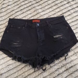 Faded black distressed Signature8 jean shorts